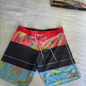 Billabong Red and Black Board Shorts with Modern Design